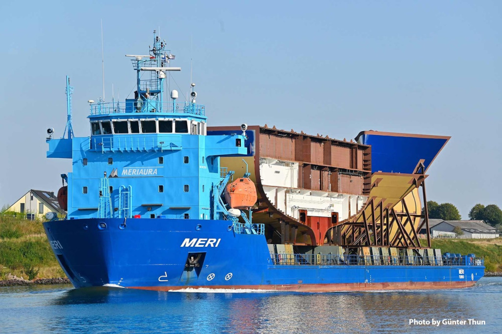 The ship Meriaura is transporting a part of a larger vessel.